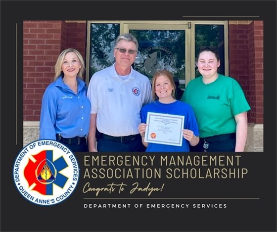 emergency services staff with student that received a scholarship