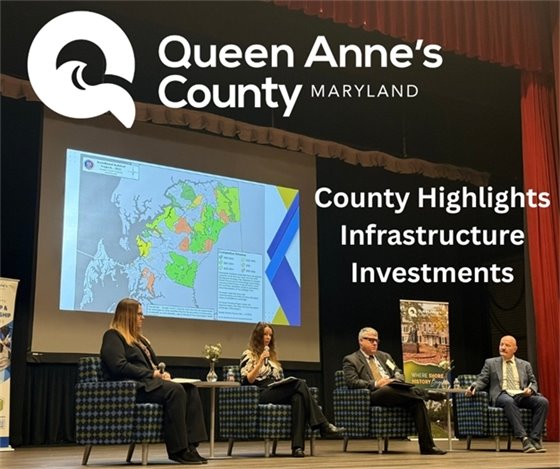 4 people sitting in chairs on a stage