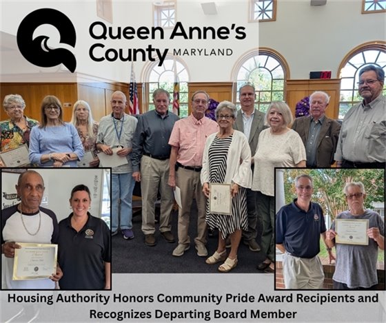 multiple people standing in a line holding certificates