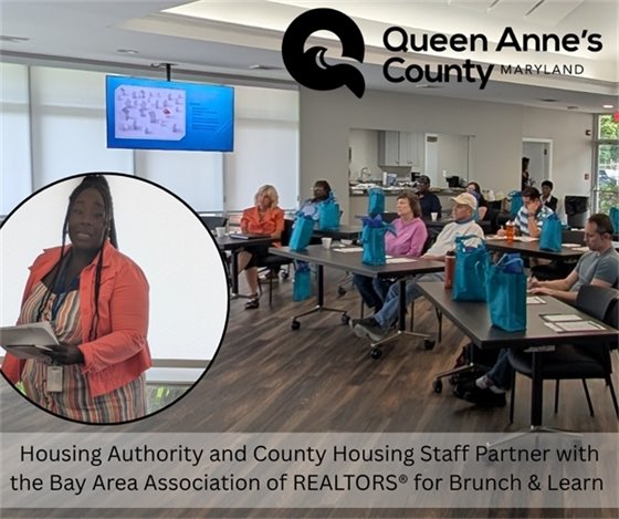 adults sitting in a classroom setting at desks