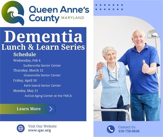 two older adults standing giving a thumbs up